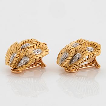 A pair of 18K gold earrings set with eight-cut diamonds.