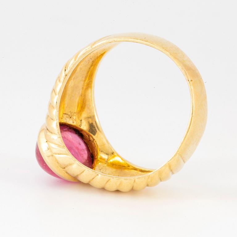 Cabochon-cut pink tourmaline ring.