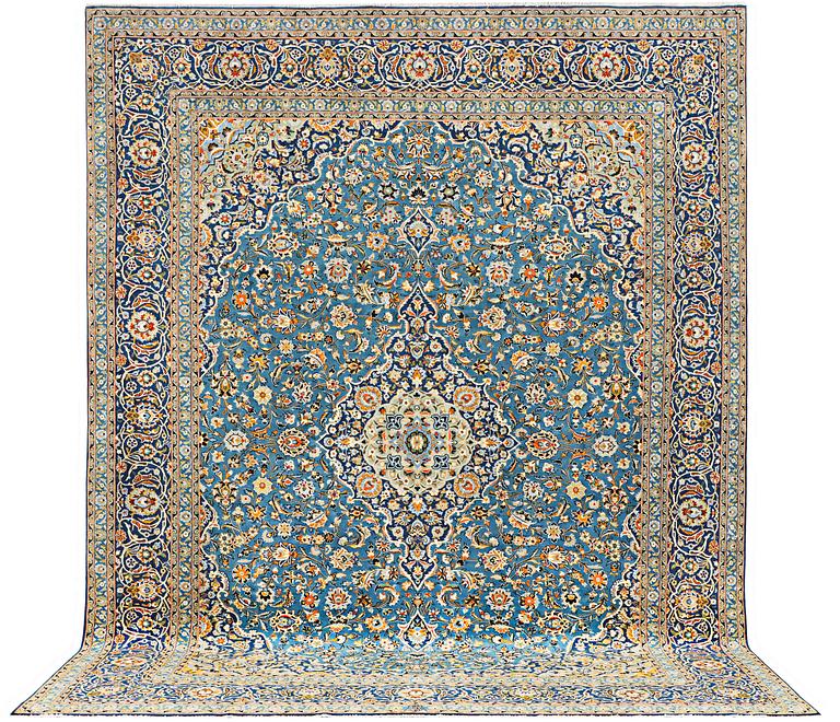 A Kashan carpet, signed Isfahanian, a. 407 x 310 cm.