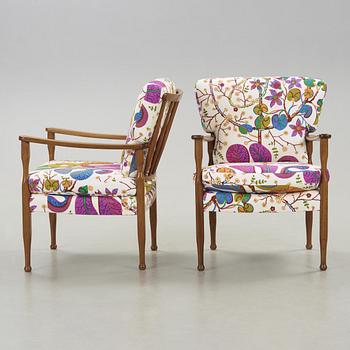 A pair of Josef Frank mahogany armchairs for Svenskt Tenn, model 891.