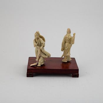 Two Soapstone figure groups, China, 20th Century.
