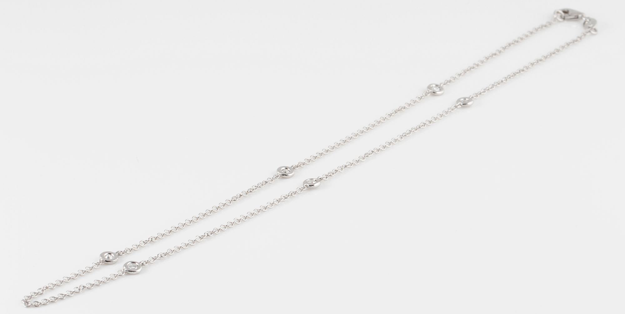 DIAMANTGRADERING, COLLIER, 18K vitguld med 6 briljantslipade diamanter ca 0.30 ct. Vikt 3,4 gram.