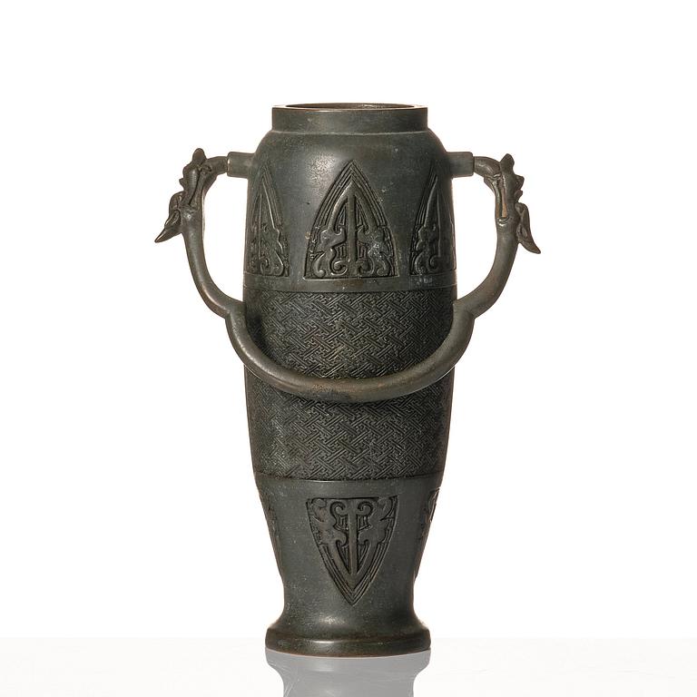 A bronze vase, late Qing dynasty with archaistic mark.