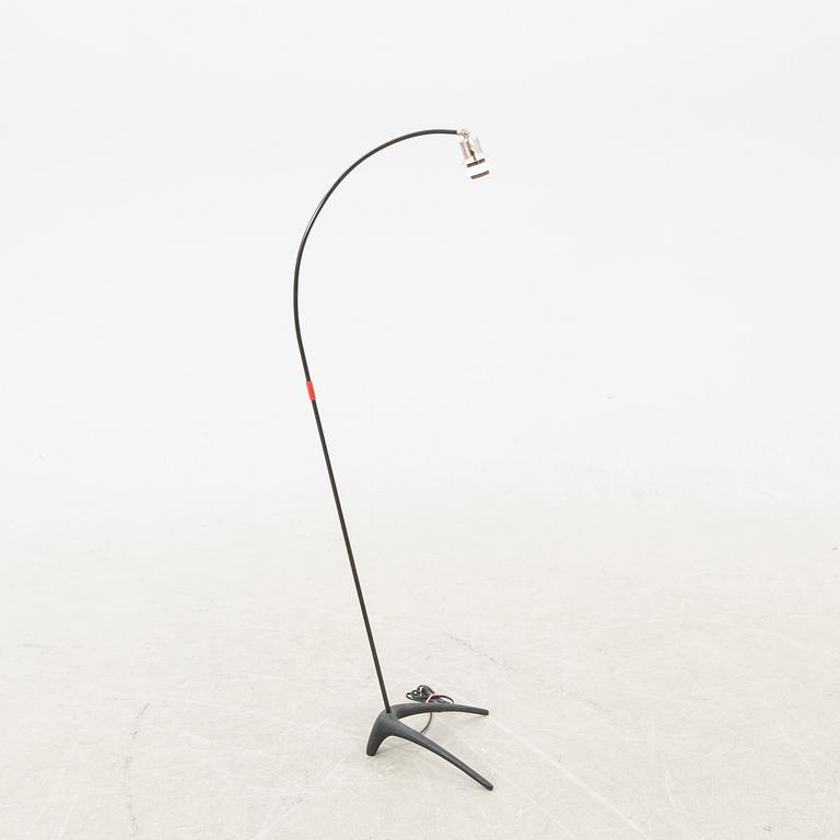 A metal floor lamp from the later part of the 20th century.