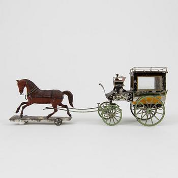 A tin horse and wagon possibly by Eichner, Germany, second half of the 19th century.