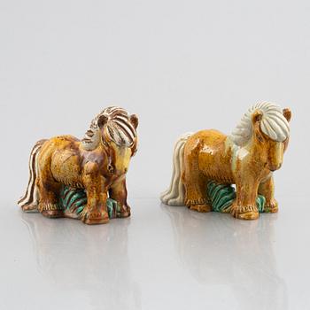 Gunnar Nylund, a pair of stoneware figurines, Rörstrand, Sweden, mid 20th century.