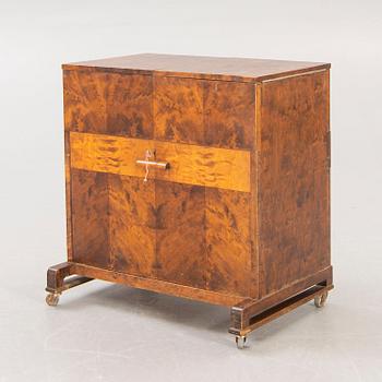 A 1930s Bodafors birch bar cabinet.