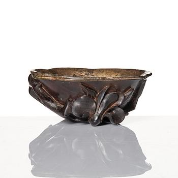 A sculptured wooden cup with silvered liner, Qing dynasty.