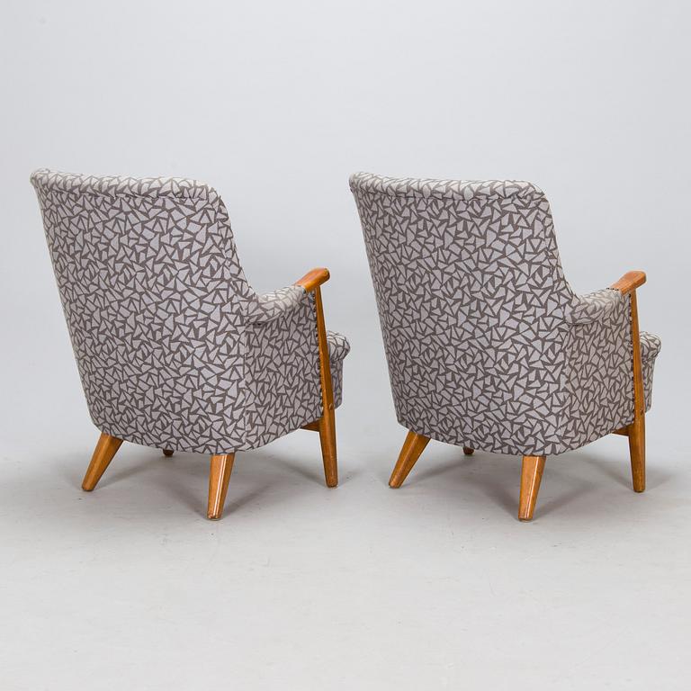 Olof Ottelin, a pair of 1950's 'Pompadour' armchairs for Oy Stockmann Ab, Keravan puusepäntehdas.