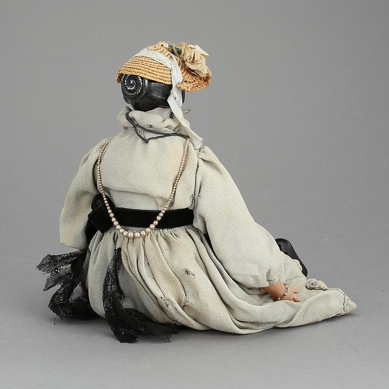 DAMDOCKA, så kallad "China head", Tyskland, 1800-talets senare del.