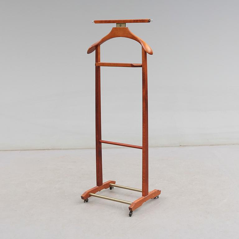 HERRBETJÄNT, Fr, Italien, 1900-talets andra hälft.