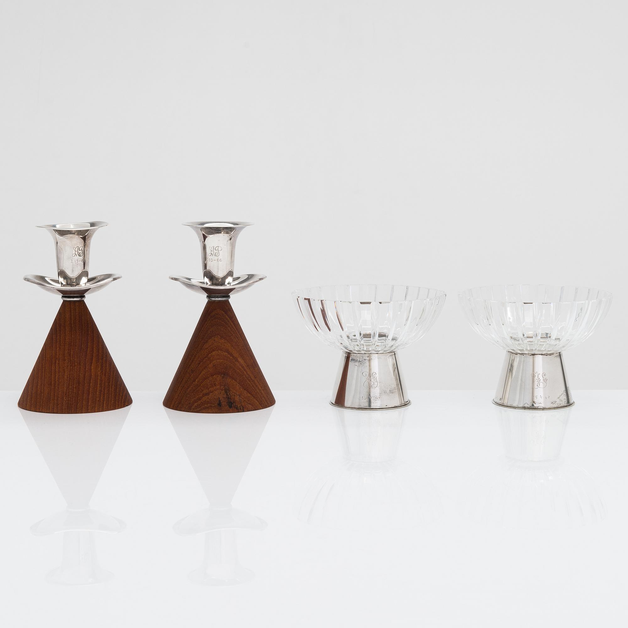 Two pairs of candlesticks, one designed by Saara Hopea, Kultakeskus, Hämeenlinna 1965.