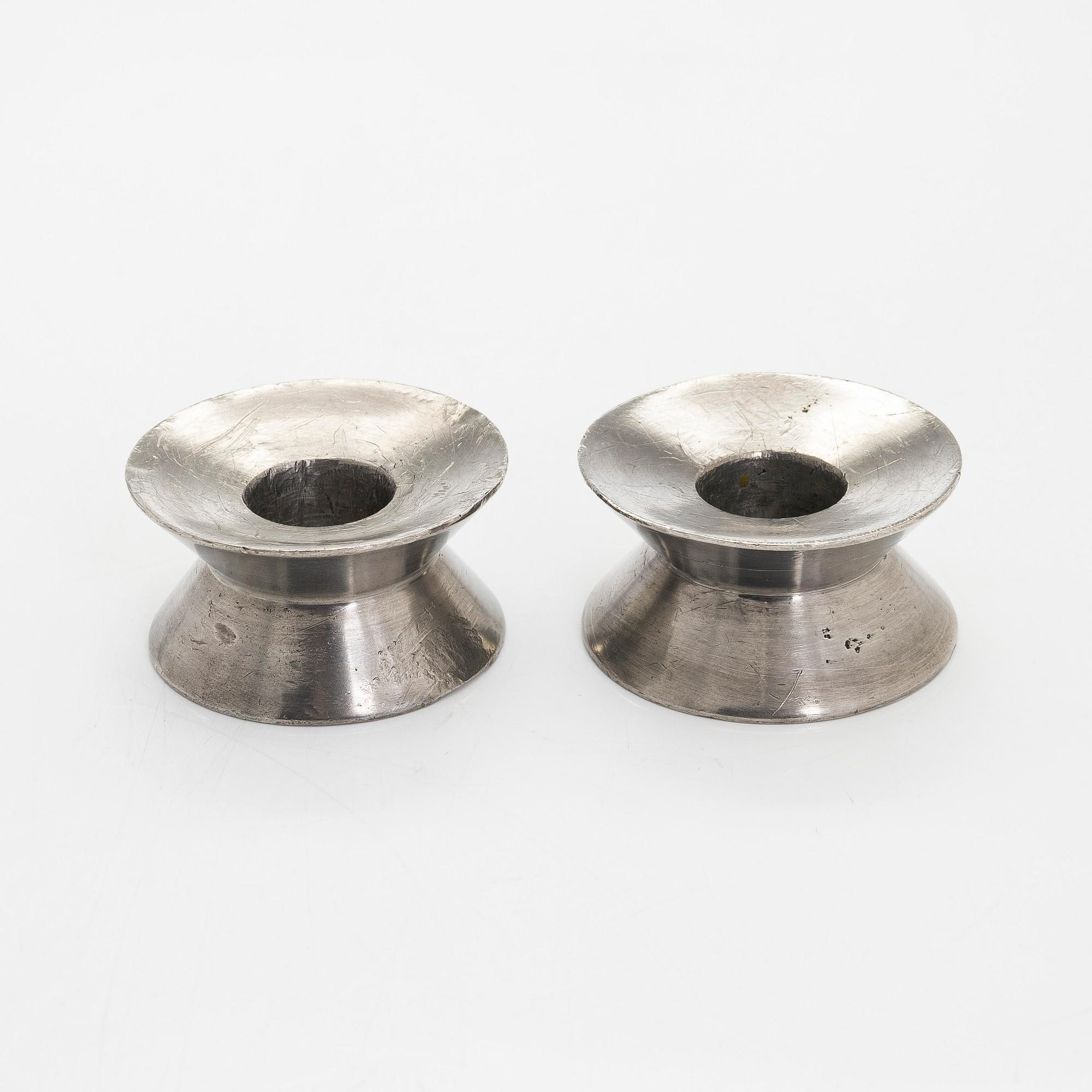 Viljo Hirvonen, a pair of rare mid-20th-century  candlesticks manufactured by Valaistustyö for Artek.