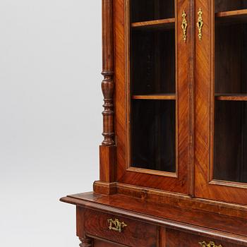 A display cabinet, late 19th century.