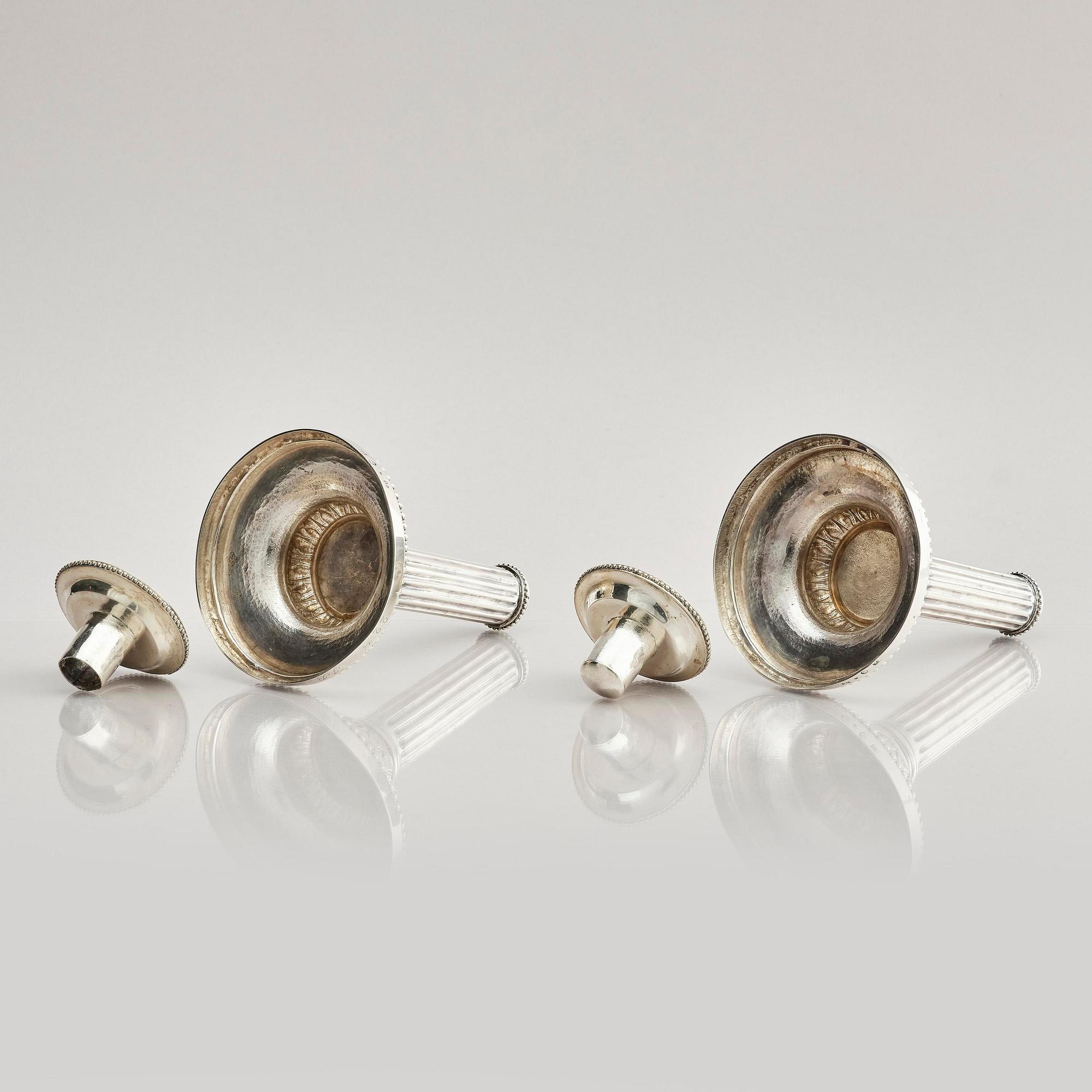 A pair of 18th century silver candlesticks, marks of Petter Eneroth, Stockholm 1786.