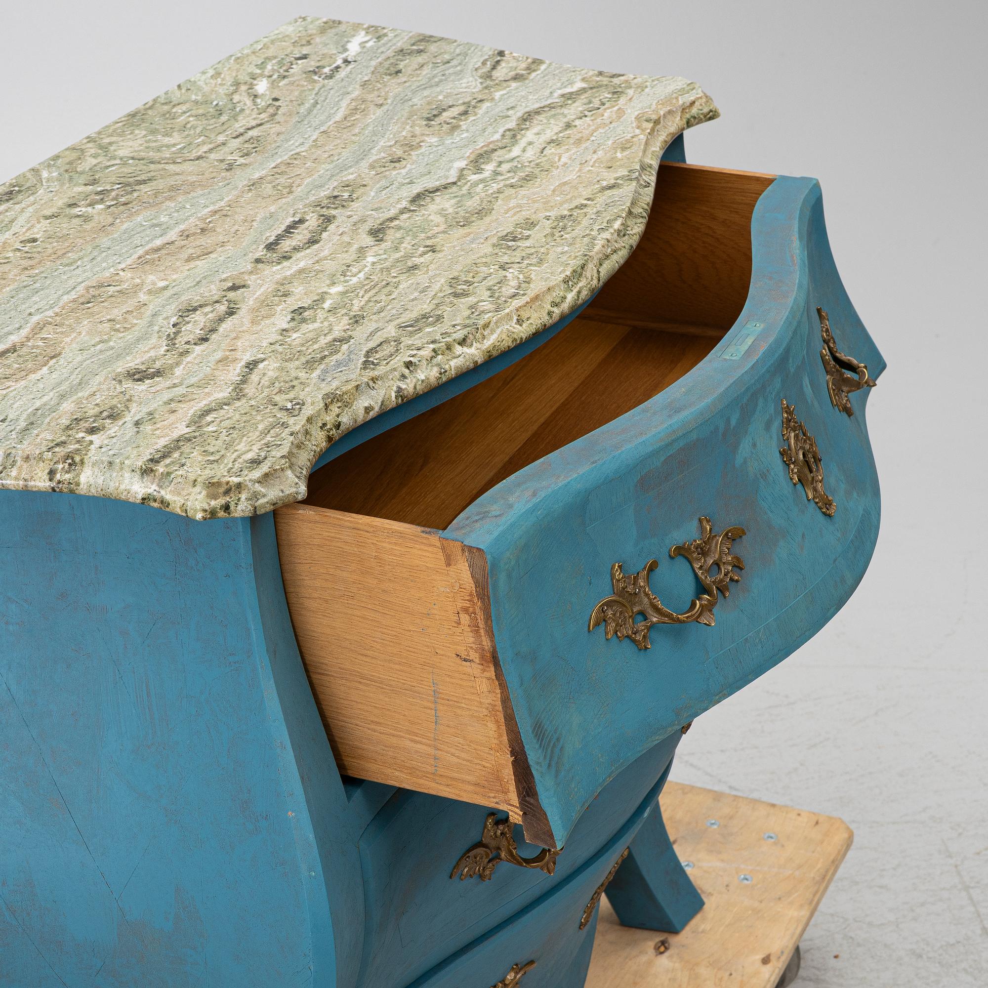 A Rococo style chest of drawers, early 20th century.