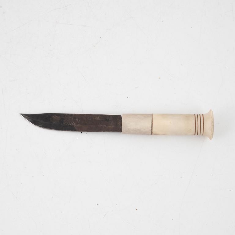 Thore Sunna, a reindeer horn knife, signed.