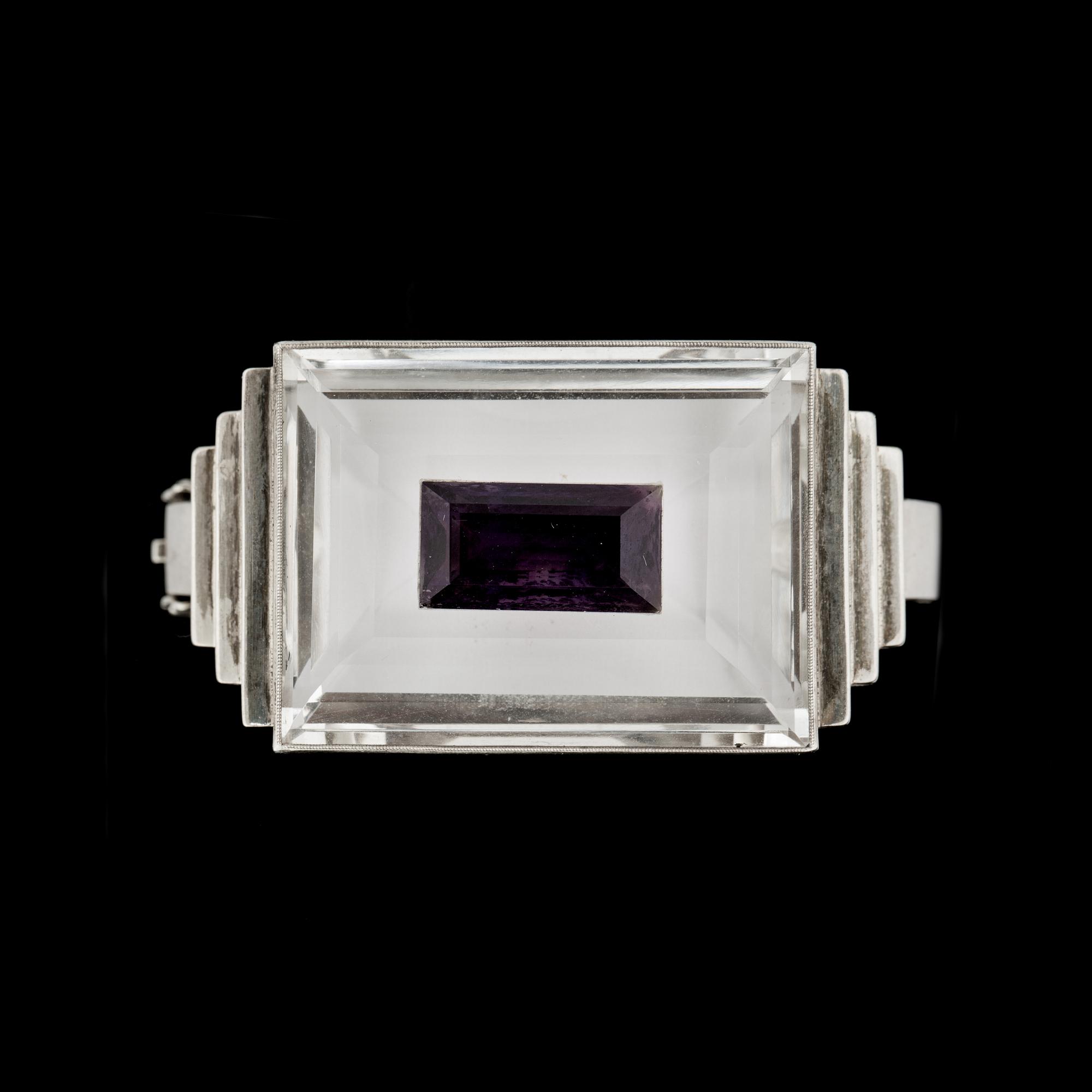 ARMRING, silver. Fasettslipad bergkristall samt ametist. Vikt ca 78 gram.