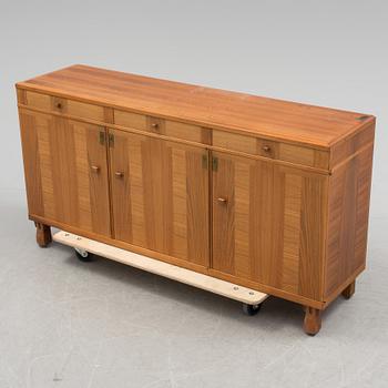 A Swedish second half of the 20th century Carl Malmsten "Ambassadör" sideboard veneered with walnut from Åfors möbler.