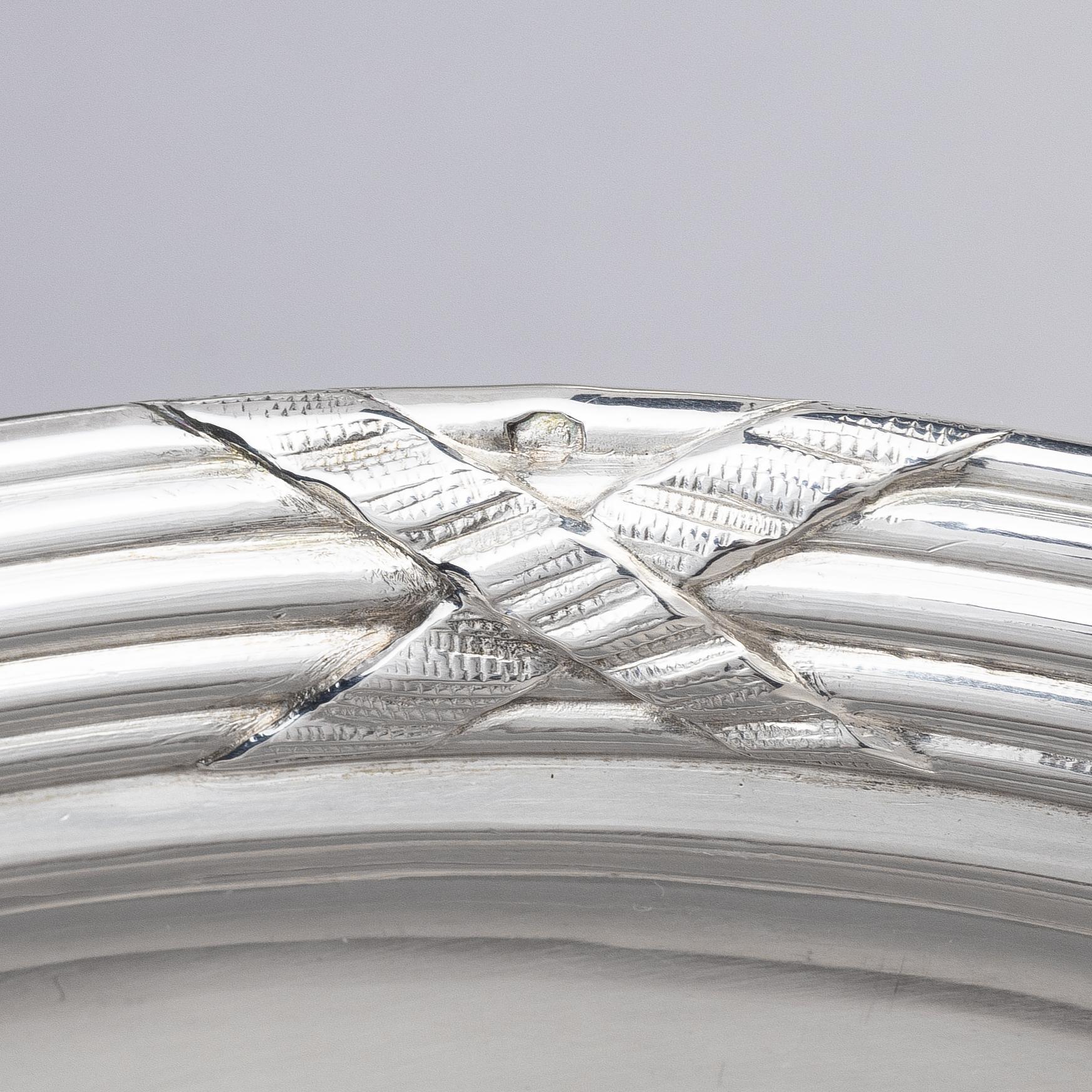 Twenty-one French silver dinner plates, marks of Maison Odiot, Paris, France, second half of the 19th century.