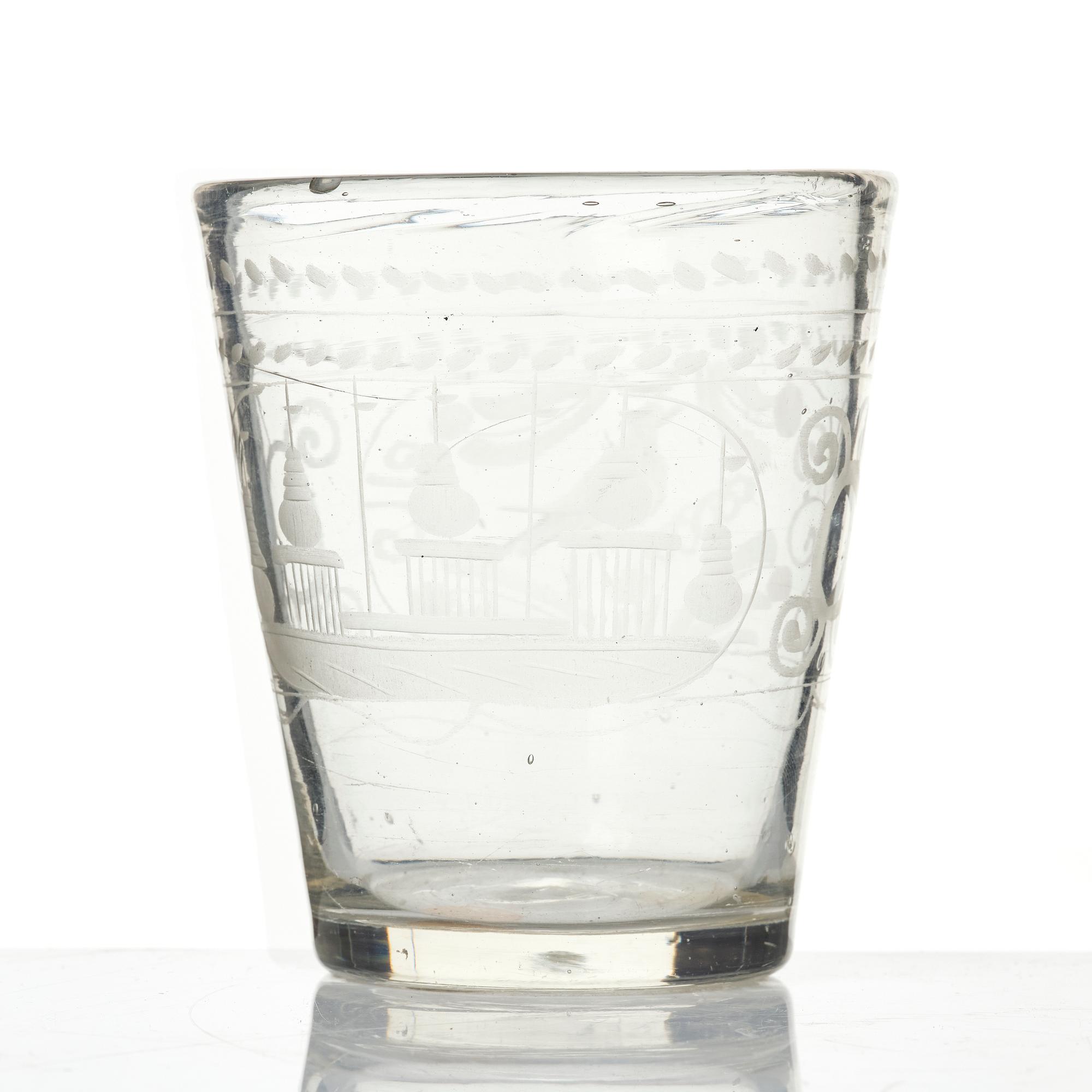 An engraved glass goblet, 18th century.