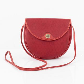 Christian Dior, a red vintage bag.