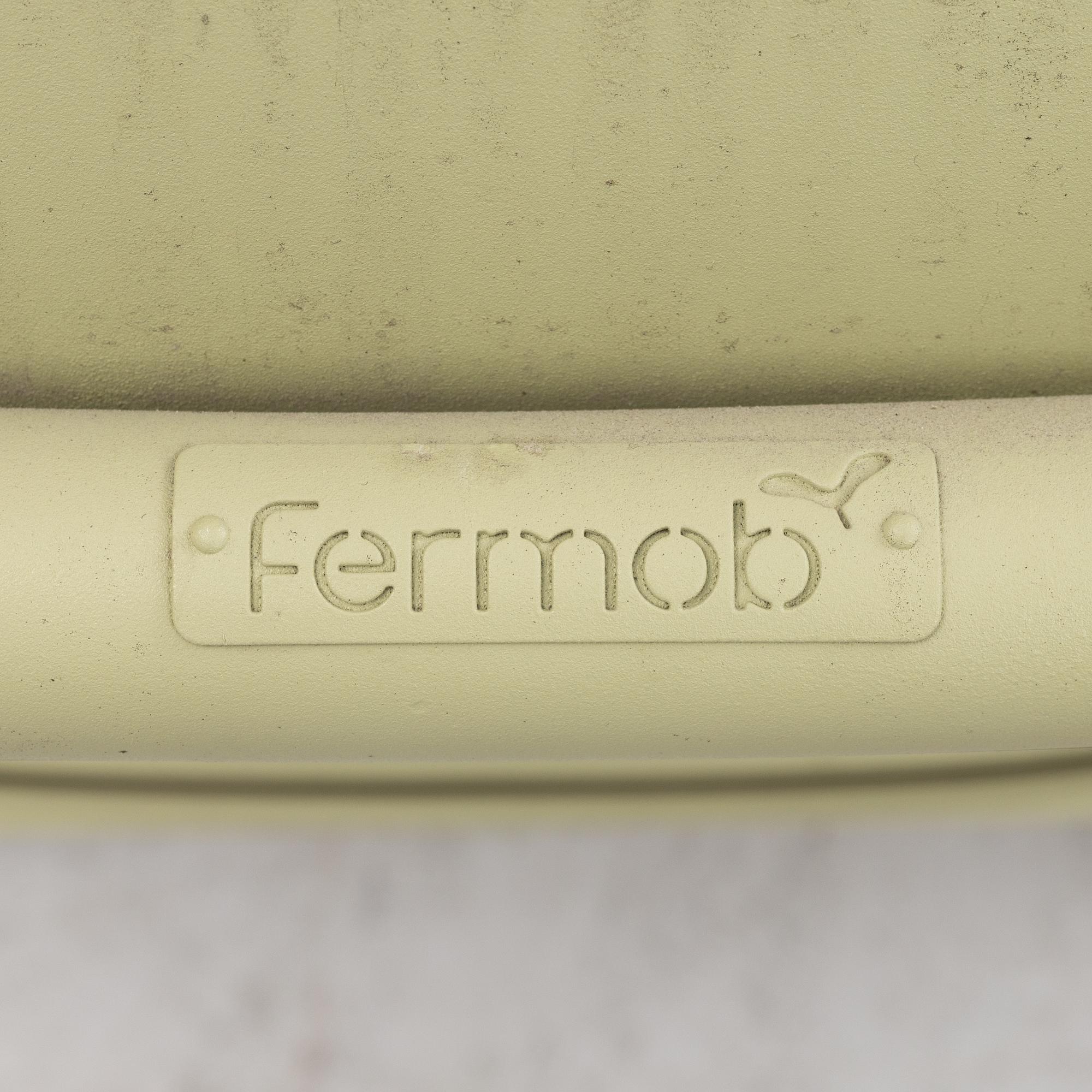 Frédéric Sofia, a table and two chairs for outdoor use, "Luxembourg" Fermob, France, 21st century.