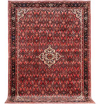 A carpet, Hosseinabad, c. 303 x 218 cm.