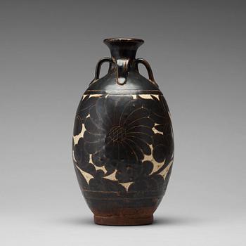 585. A black-glazed sgraffito vase, presumably Yuan Dynasty.