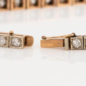 A 14K gold bracelet set with old-cut diamonds.