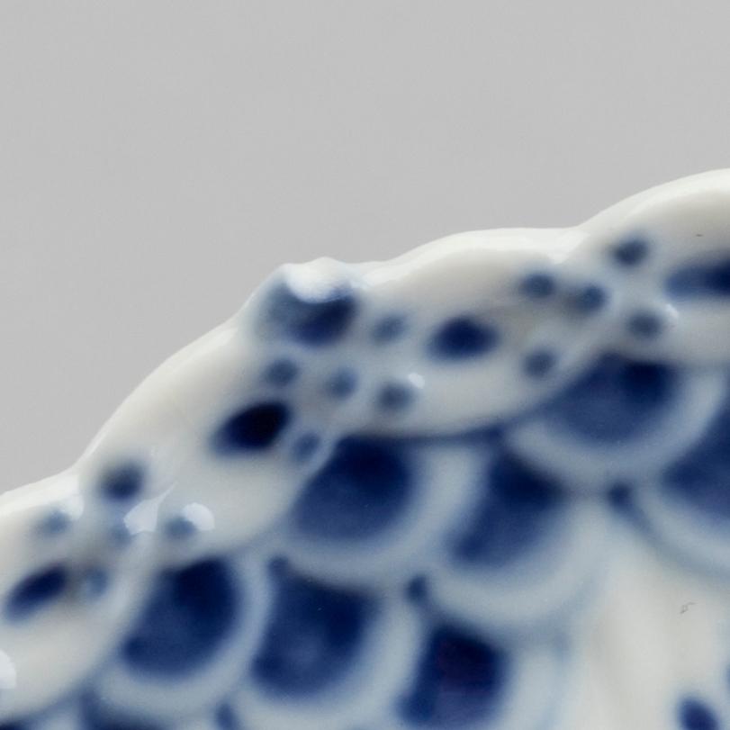 A set of 17 porcelain chocolat cups and saucers Musselmalet Royal Copenhagen Denmark.