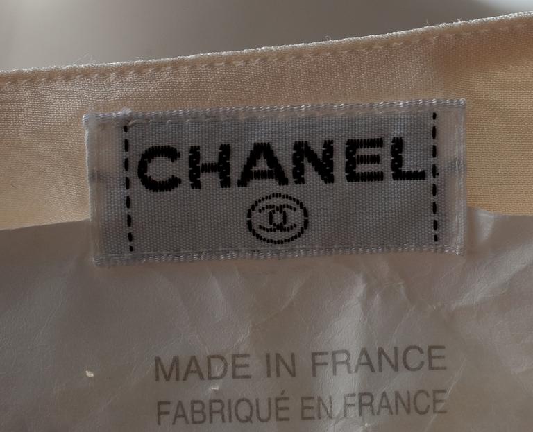 A Chanel silk blouse.