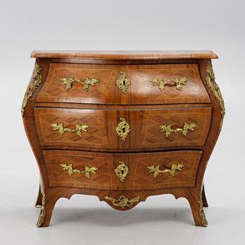 A Rococo style chest of drawers, 19th century.