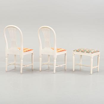 A dining table with eight chairs and a stool, Gustavian style, second half of the 20th Century.