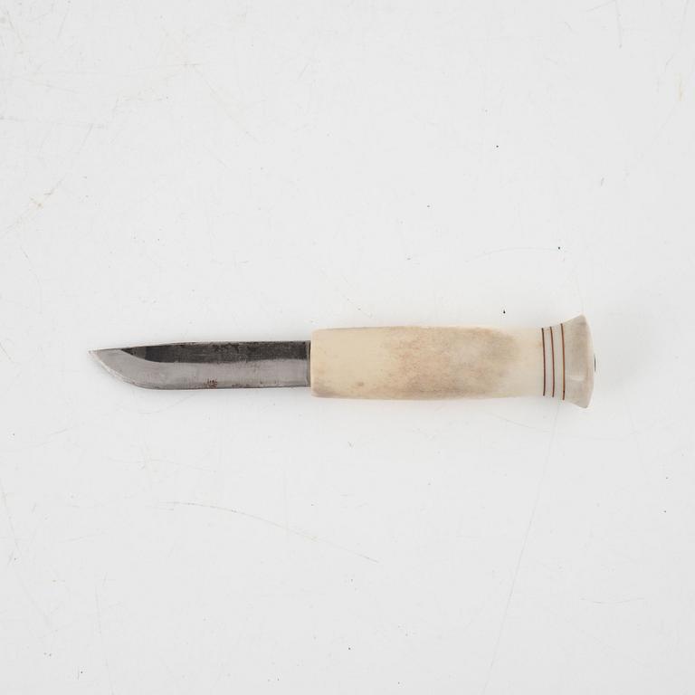 Jon Tomas Utsi, a reindeer horn knife, signed.