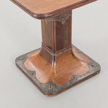 A mahogany veneered Art Nouveau table, early 20th century.