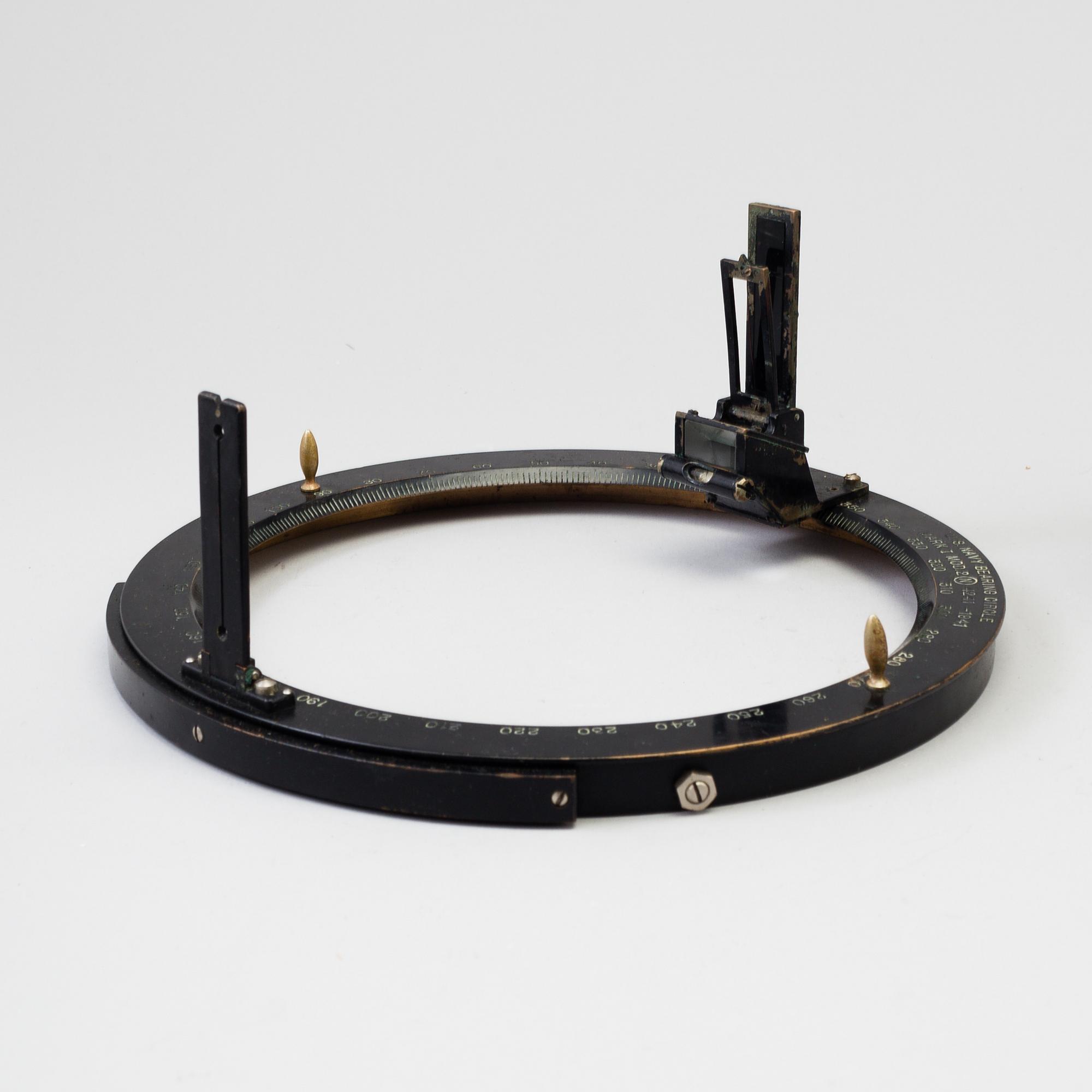 A 20th century Stadimeter and a bearing circle, both in cases. Marked U.S. Navy.