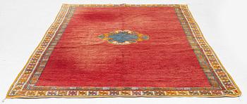 A North African carpet, c. 294 x 198 cm.