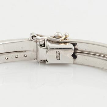 Armlänk, 18K vitguld med briljantslipade diamanter.