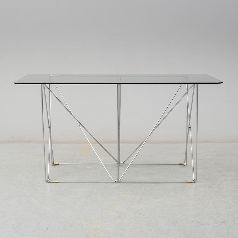 A glass dining table by IKEA.