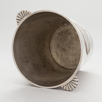 A silver plated brass Charles Heidsieck Champagne cooler.