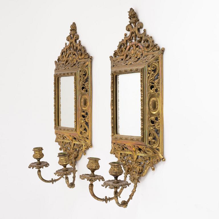 A pair of metal mirror sconces, first half of the 20th century.