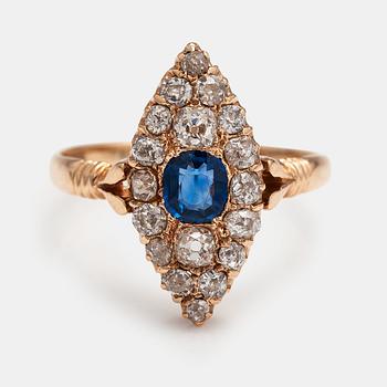 A 14K gold ring with a sapphire and old-cut diamonds ca. 0.90 ct in total. Russia, turn of the 20th century.