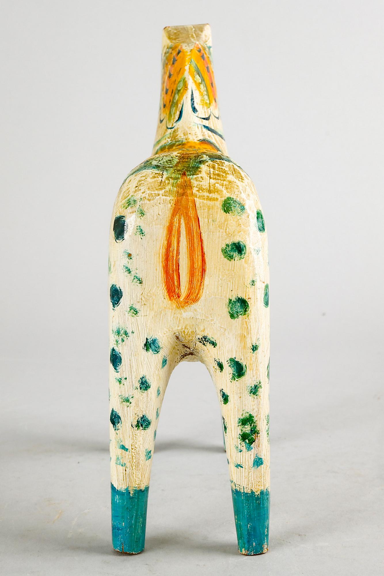 An early 20th century wooden horse, "Dalahäst".
