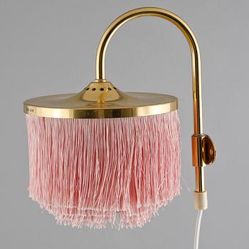 A pair of wall lamps by Hans-Agne Jakobsson for Markaryd from the second half of the 20th century.