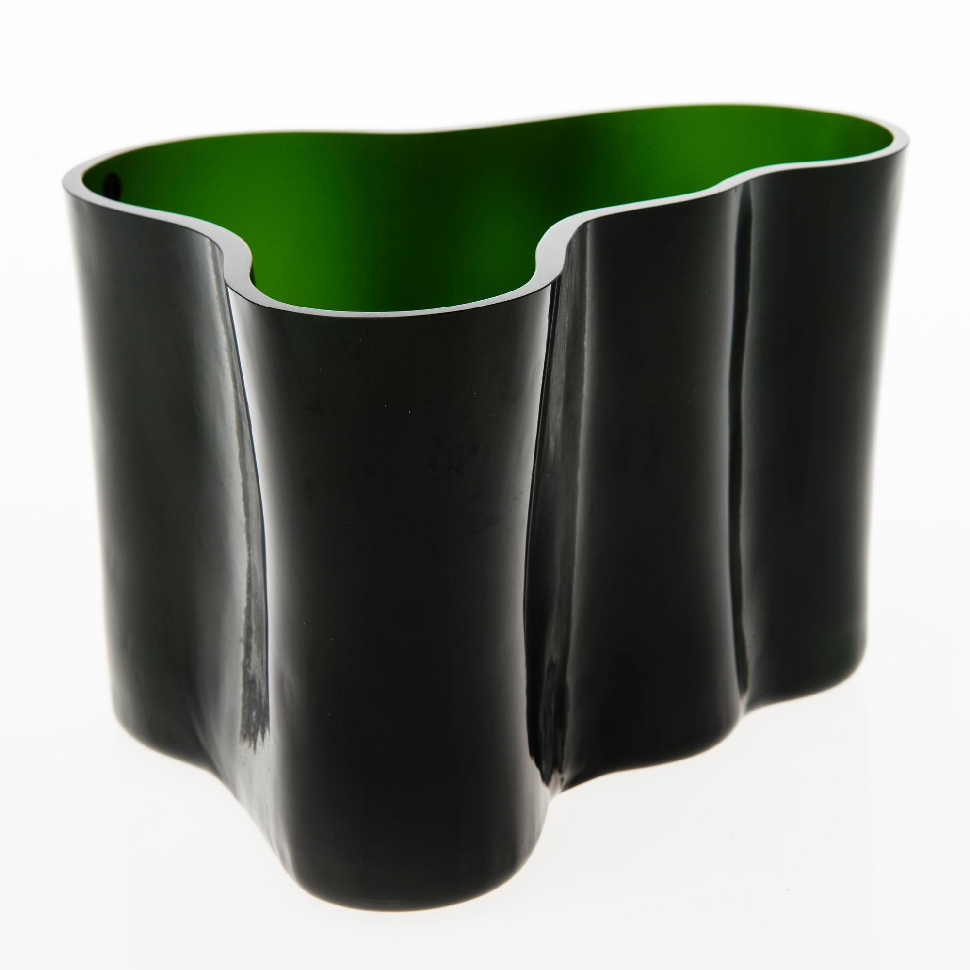 An Alvar Aalto vas "Savoy" Iittala 2011 with number 12/75.