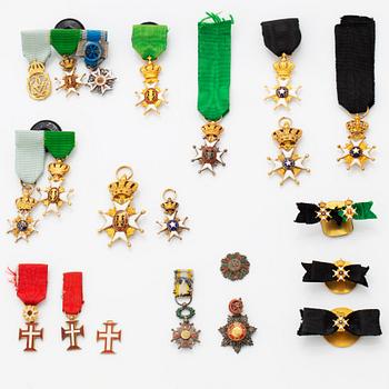 A group of miniature decorations, mostly Swedish.