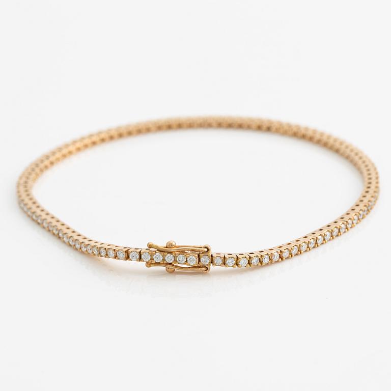 Tennisarmband 18K guld med runda briljantslipade diamanter.