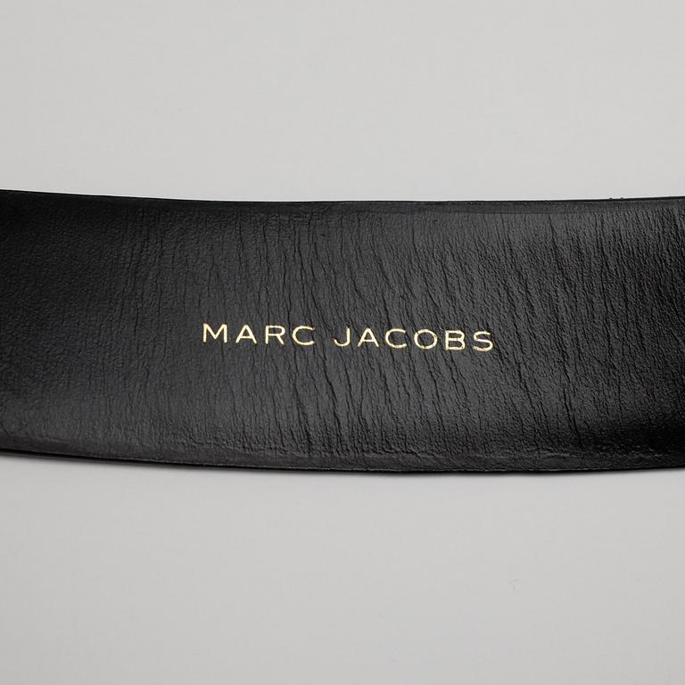 MARC JACOBS, a black leather belt with gold colored hardwear.