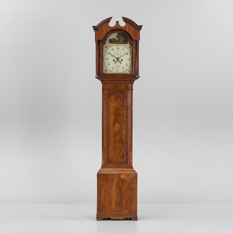 A mahognay long case clock from around the year 1800, H Bunyan Lincoln.